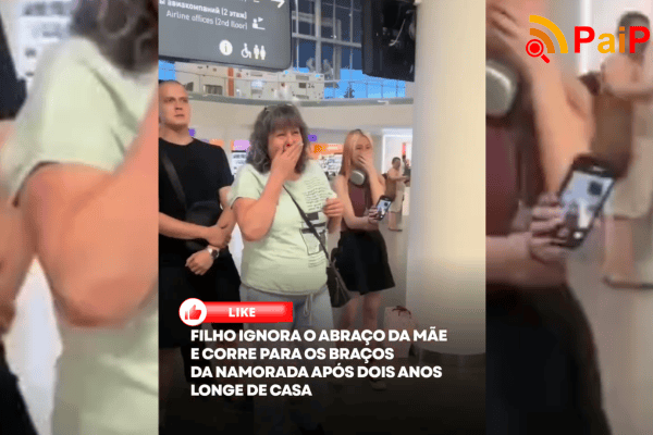 Filho ignora o abraço da mãe e corre para os braços da namorada após dois anos longe de casa