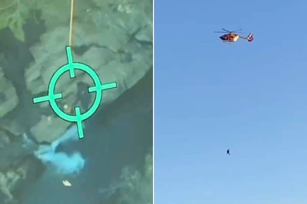 Bombeiro realiza rapel em helicóptero para resgatar mulher em trilha de MG