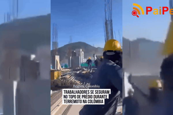Trabalhadores se seguram no topo de prédio durante terremoto na Colômbia